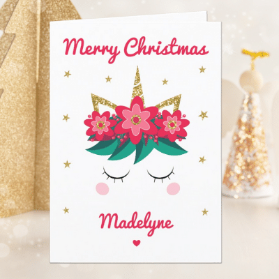Personalized unicorn greeting card with cute unicorn face, red flowers, berries and glitter.