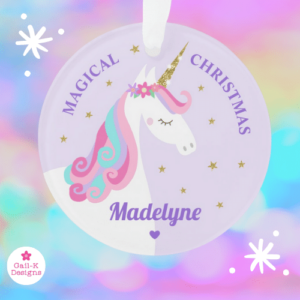 Unicorn Christmas ornament with a cute rainbow unicorn, flowers and gold glitter stars on a purple background.