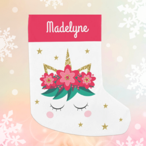 Personalized festive unicorn Christmas stocking with glitter and red flowers.