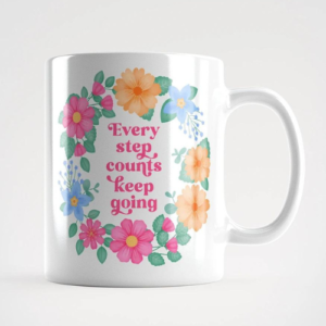 Motivational mug with quote: Every step counts keep going. Pink text with blue, pink and orange floral wreath with green leaves and foliage.
