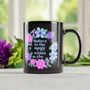 Motivational mug - black mug with floral wreath and motivational quote reads: Believe in the magic within you.