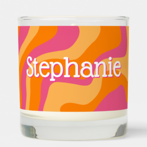 Dopamine decor candle with groovy retro swirls, personalized name and inspirational quote.