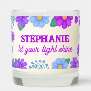 Personalized name gift candle with inspirational quote: Let your light shine and blue, purple and violet flowers and foliage and script typography.