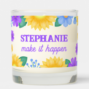 Personalized name gift candle with inspirational quote: Make it happen and sunflowers with purple and blue flowers and foliage and script typography.