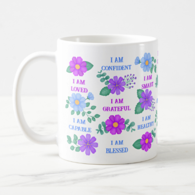 Positive affirmation gift mug with customizable I am affirmations and purple and blue floral design.